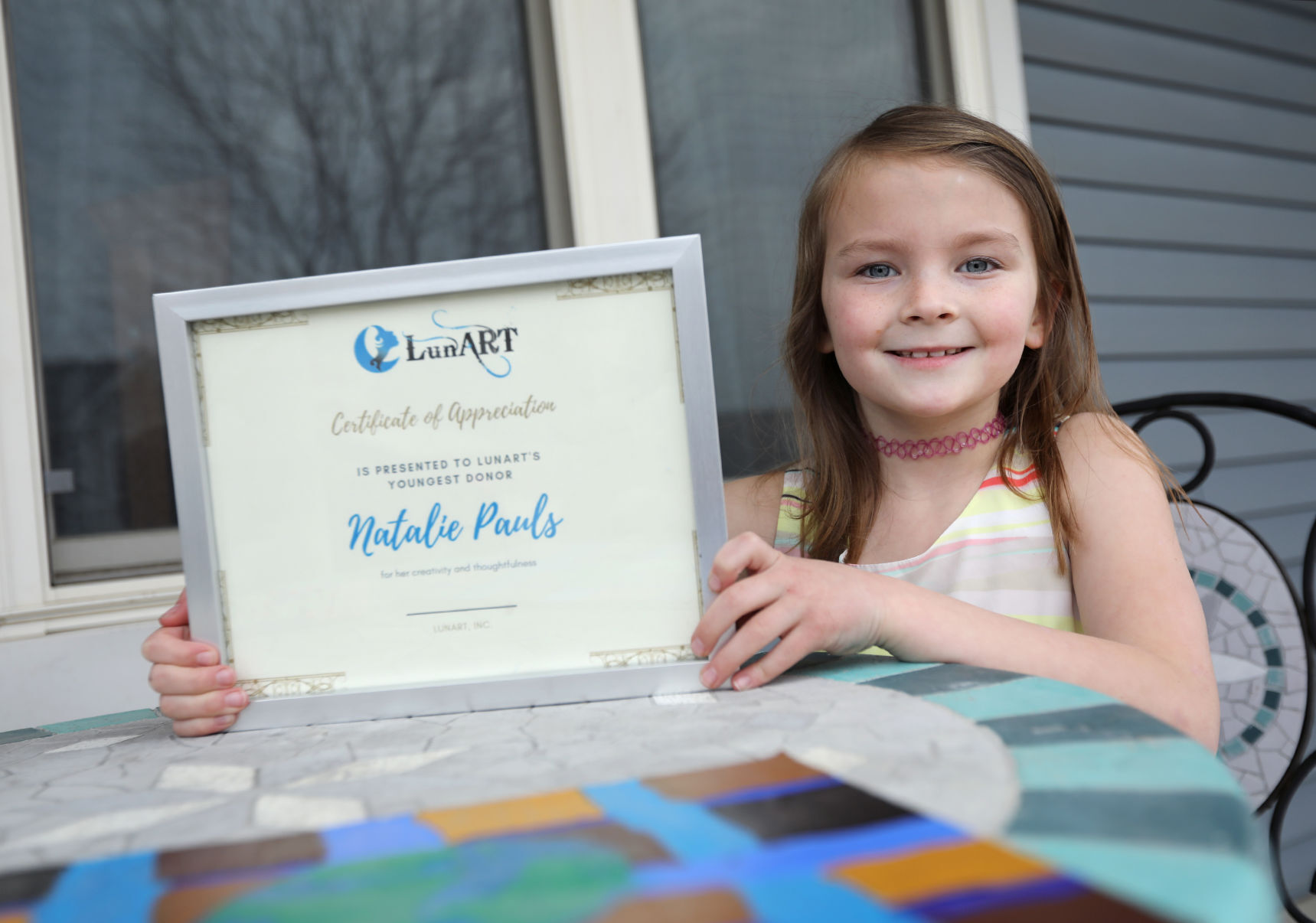 Natalie Pauls with certificate from LunART